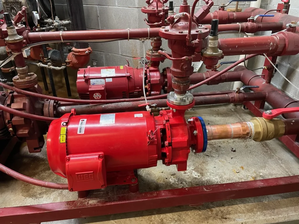 Anonymized commercial booster-pump system serviced by JRS Corp